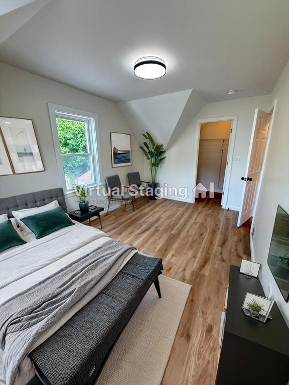76 Garfield St, Quincy, MA 02169 - bedroom with light wood finished floors and vaulted ceiling