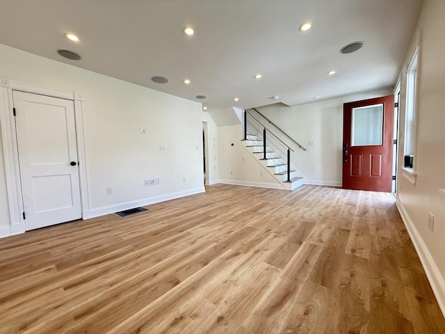 76 Garfield St, Quincy, MA 02169 - entryway with stairway, light wood finished floors, baseboards, and recessed lighting