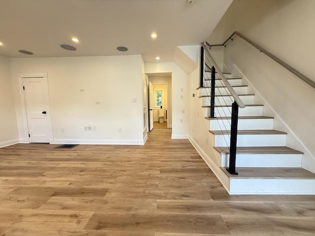 76 Garfield St, Quincy, MA 02169 - stairs with baseboards, recessed lighting, and wood finished floors