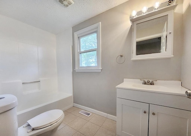 31 Harvard Ct, Dracut, MA 01826 - bathroom with toilet, vanity, a textured ceiling, tile patterned flooring, and baseboards