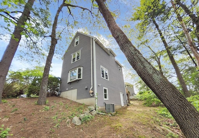 31 Harvard Ct, Dracut, MA 01826 - view of property exterior featuring cooling unit