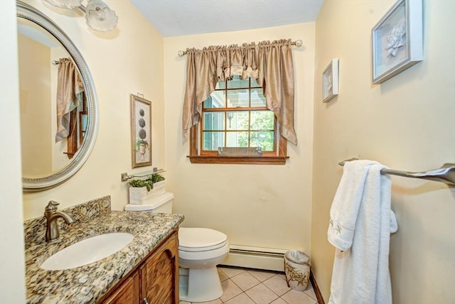11 Balmoral Dr, Methuen, MA 01844 - bathroom featuring a baseboard radiator, toilet, tile patterned floors, vanity, and baseboards