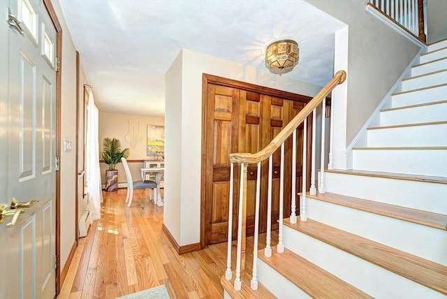 11 Balmoral Dr, Methuen, MA 01844 - entryway featuring light wood-type flooring, stairs, and baseboards