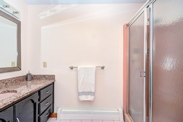 11 Balmoral Dr, Methuen, MA 01844 - full bath with baseboard heating, vanity, and a shower stall