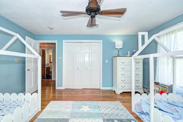 11 Balmoral Dr, Methuen, MA 01844 - bedroom with multiple windows, wood finished floors, and baseboards