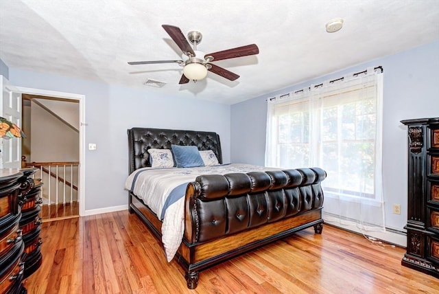 11 Balmoral Dr, Methuen, MA 01844 - bedroom with light wood-style flooring, multiple windows, baseboards, and a ceiling fan