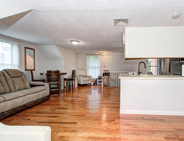 11 Balmoral Dr, Methuen, MA 01844 - living room with light wood-style floors