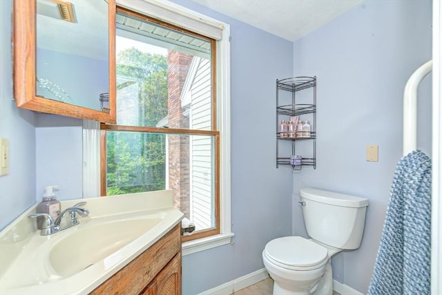 11 Balmoral Dr, Methuen, MA 01844 - bathroom featuring toilet, baseboards, and vanity
