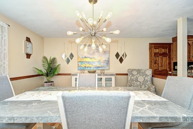 11 Balmoral Dr, Methuen, MA 01844 - dining space featuring a chandelier