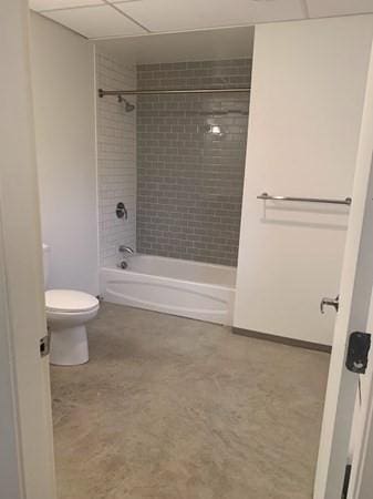 160 Water St Unit 212, Williamstown, MA 01267 - full bath featuring toilet, tub / shower combination, and a paneled ceiling