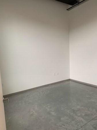 160 Water St Unit 212, Williamstown, MA 01267 - empty room with finished concrete floors and baseboards