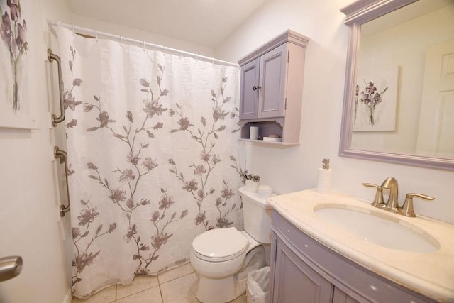 bathroom with toilet, a shower with curtain, vanity, and tile patterned floors