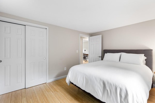 13 Shagbark Rd, Sandwich, MA 02644 - bedroom featuring wood finished floors, baseboards, and a closet