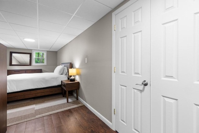 13 Shagbark Rd, Sandwich, MA 02644 - bedroom featuring baseboards, dark wood-style floors, and a paneled ceiling