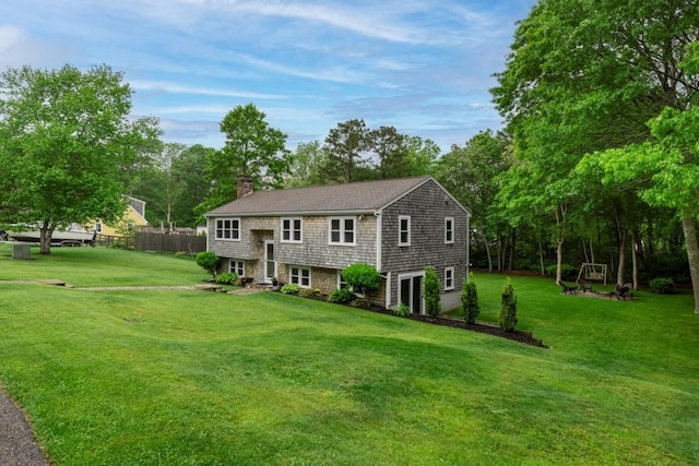13 Shagbark Rd, Sandwich, MA 02644 - view of front of home with a chimney and view of wooded area