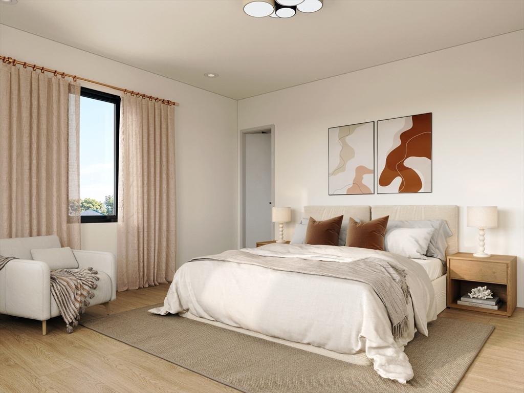 bedroom featuring light wood-type flooring