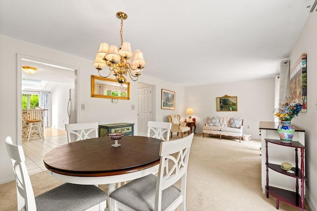 42 Brickett Hill Cir Unit 114, Haverhill, MA 01830 - dining space with a chandelier and light carpet