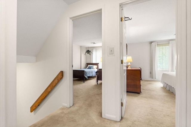 42 Brickett Hill Cir Unit 114, Haverhill, MA 01830 - hall with light colored carpet, plenty of natural light, and an upstairs landing