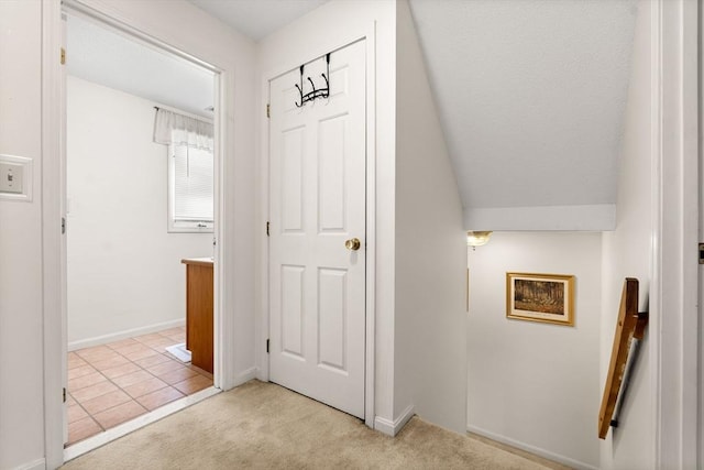 42 Brickett Hill Cir Unit 114, Haverhill, MA 01830 - corridor featuring light carpet and baseboards
