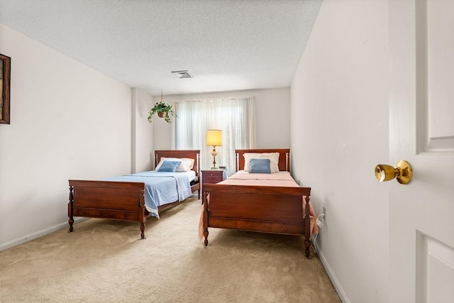42 Brickett Hill Cir Unit 114, Haverhill, MA 01830 - bedroom with carpet flooring and a textured ceiling