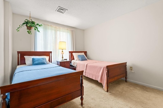 42 Brickett Hill Cir Unit 114, Haverhill, MA 01830 - bedroom with light carpet and baseboards