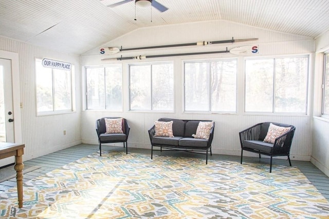 sunroom / solarium featuring lofted ceiling and a ceiling fan