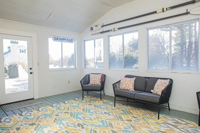 sunroom / solarium with vaulted ceiling