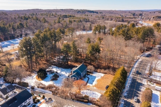 bird's eye view featuring a forest view