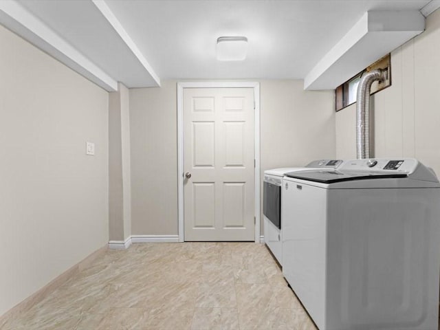 189 Brigham Hill Rd, Grafton, MA 01536 - laundry area with washer and clothes dryer and baseboards