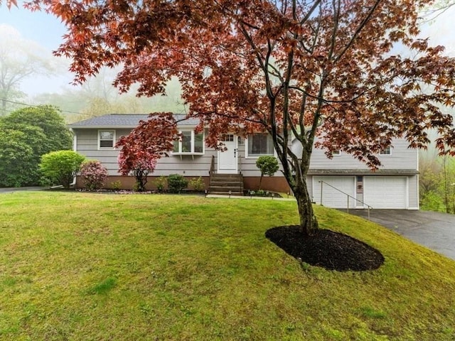 189 Brigham Hill Rd, Grafton, MA 01536 - view of front of property featuring asphalt driveway, a front lawn, and a garage