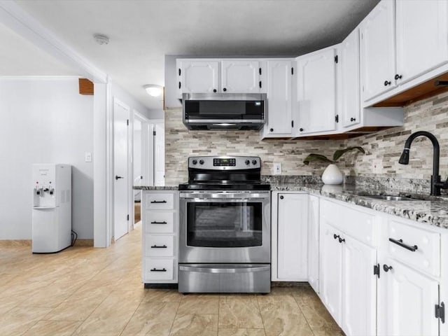 189 Brigham Hill Rd, Grafton, MA 01536 - kitchen featuring appliances with stainless steel finishes, a sink, backsplash, and light stone counters