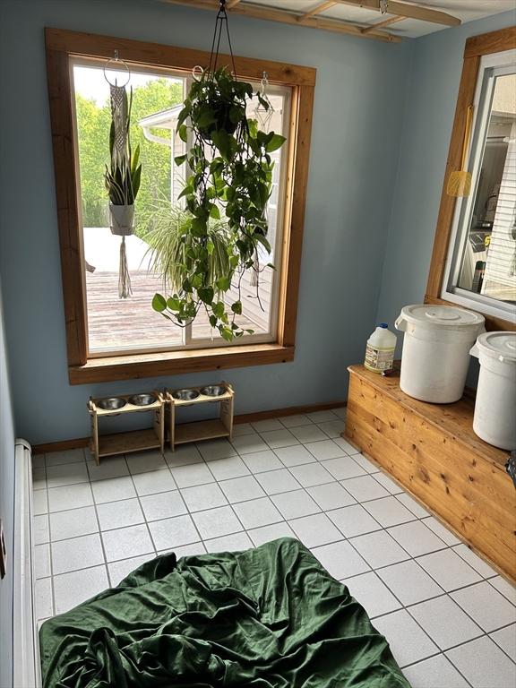 554 Main St, Becket, MA 01223 - living area featuring baseboards and light tile patterned floors