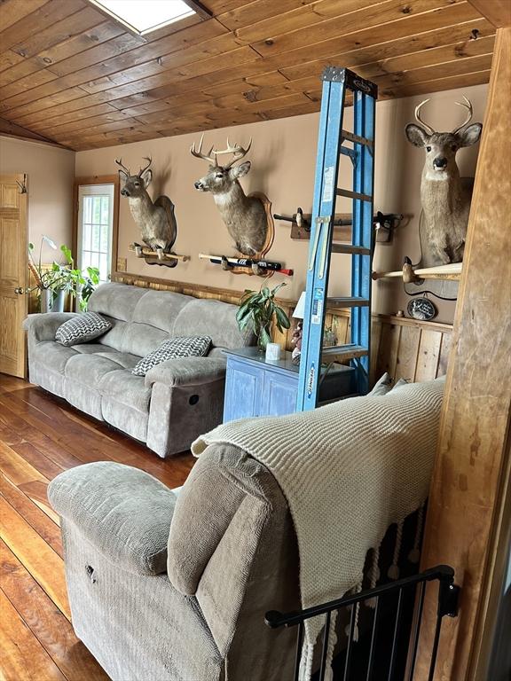 554 Main St, Becket, MA 01223 - living area with wood-type flooring and wood ceiling