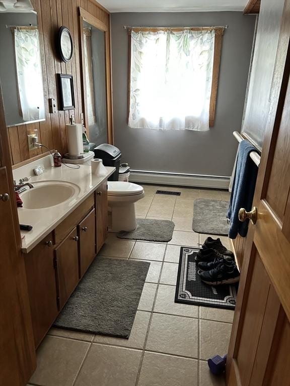 554 Main St, Becket, MA 01223 - bathroom with healthy amount of natural light, vanity, tile patterned floors, and a baseboard radiator