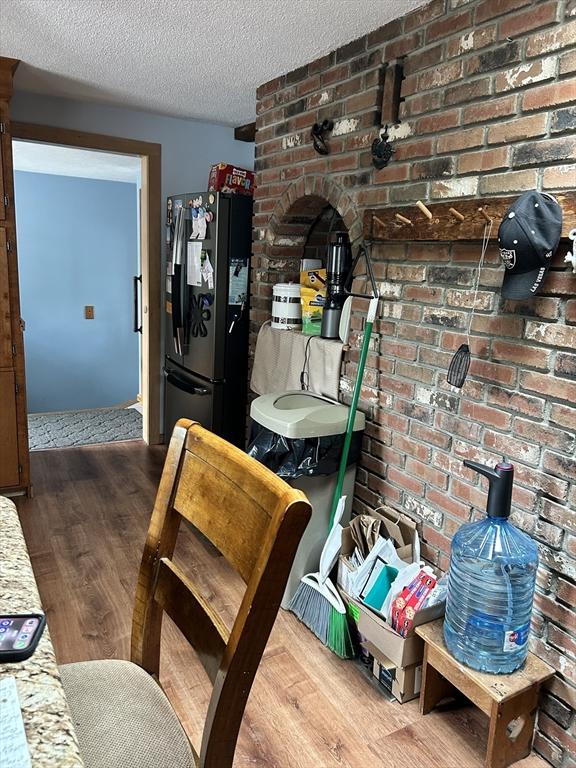 554 Main St, Becket, MA 01223 - dining area featuring wood finished floors and a textured ceiling