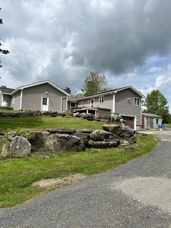 554 Main St, Becket, MA 01223 - view of home's exterior featuring a garage