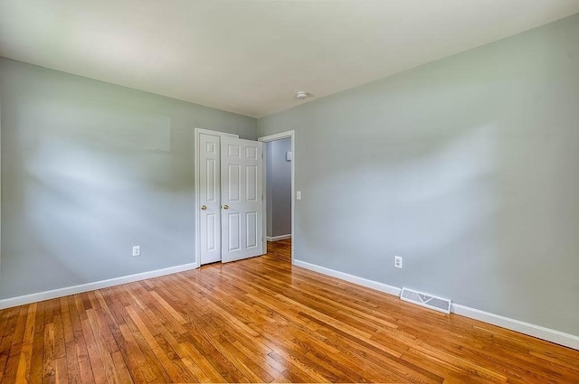 62 Forest St, Middleboro, MA 02346 - empty room with baseboards, wood-type flooring, and a smoke detector