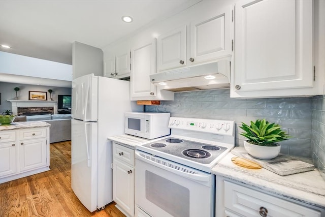 1441 Old Post Rd, Barnstable, MA 02648 - kitchen featuring white appliances, under cabinet range hood, light wood-type flooring, white cabinets, and recessed lighting