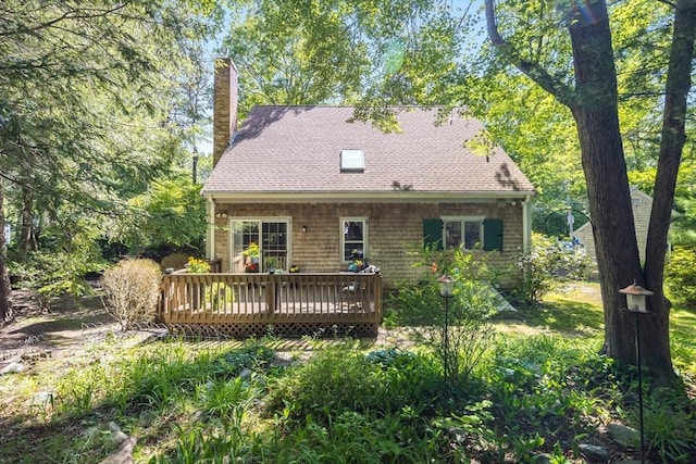 1441 Old Post Rd, Barnstable, MA 02648 - rear view of property with a deck, a chimney, and roof with shingles