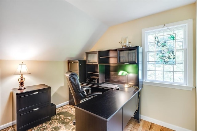 1441 Old Post Rd, Barnstable, MA 02648 - home office featuring lofted ceiling, plenty of natural light, and light wood-type flooring