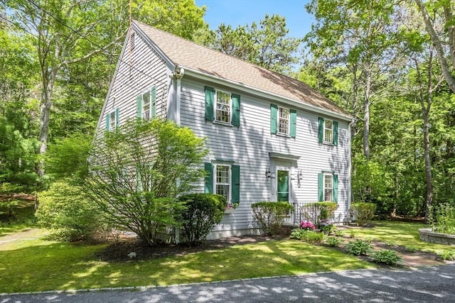 1441 Old Post Rd, Barnstable, MA 02648 - colonial inspired home featuring a front lawn and a shingled roof