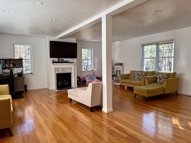 99 Dudley Rd, Oxford, MA 01540 - living area featuring a fireplace, light wood-style flooring, baseboards, and recessed lighting