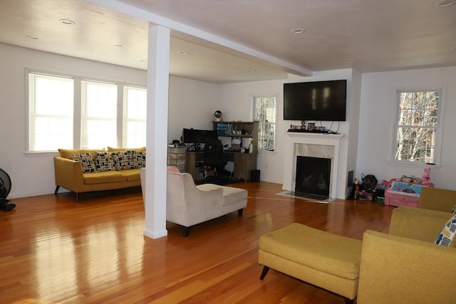 99 Dudley Rd, Oxford, MA 01540 - living area featuring light wood-style flooring, healthy amount of natural light, beamed ceiling, and recessed lighting