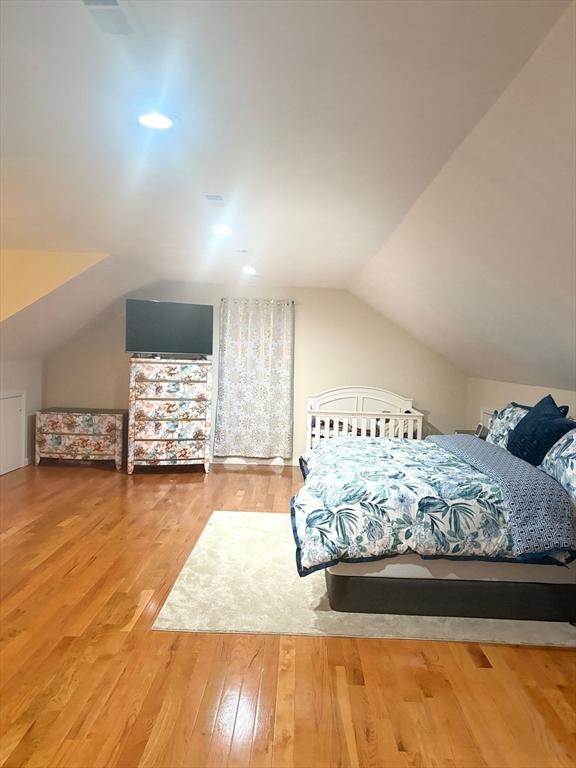 99 Dudley Rd, Oxford, MA 01540 - bedroom featuring vaulted ceiling and wood finished floors