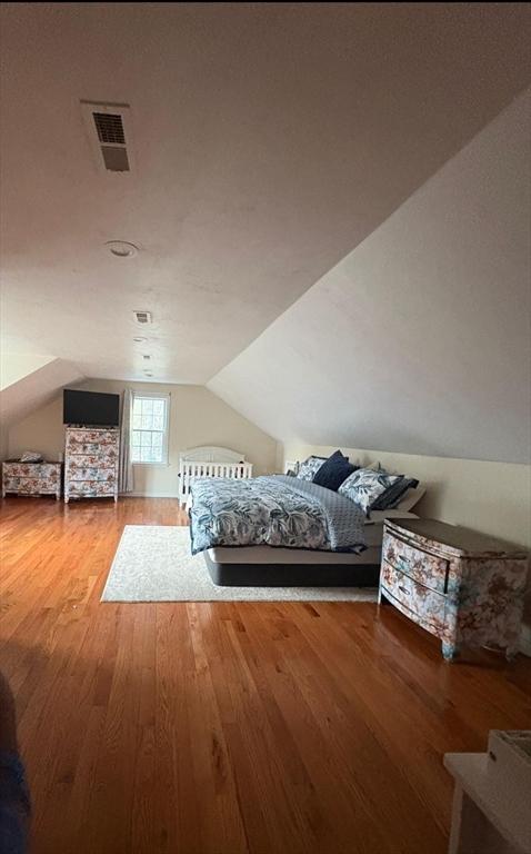 99 Dudley Rd, Oxford, MA 01540 - bedroom with wood finished floors and lofted ceiling