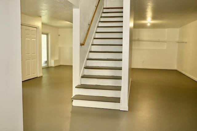 99 Dudley Rd, Oxford, MA 01540 - stairs featuring concrete flooring and baseboards