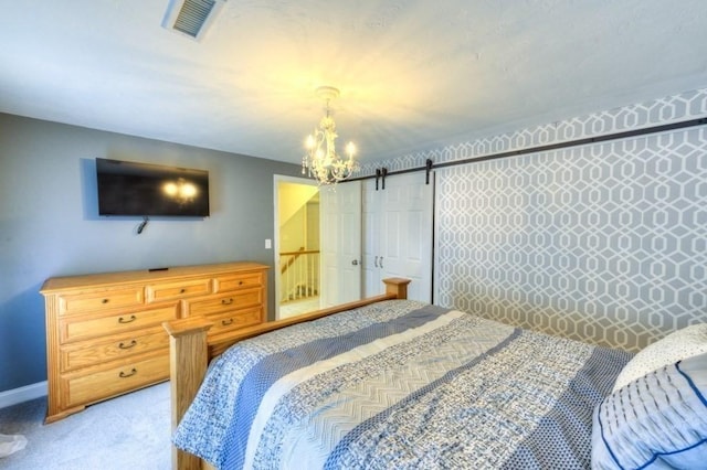 15 Bailin Dr, Worcester, MA 01604 - bedroom featuring a chandelier, a barn door, light colored carpet, and baseboards