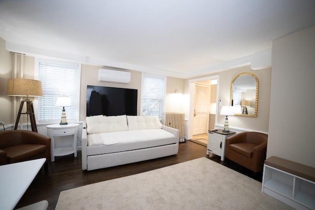 living room featuring radiator heating unit, dark hardwood / wood-style flooring, and a wall mounted AC