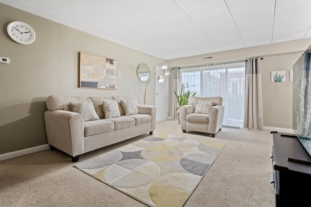 10 Foster St Unit 203, Wakefield, MA 01880 - carpeted living area with baseboards and visible vents