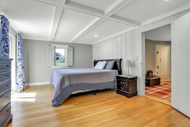 bedroom featuring light wood-style flooring, beamed ceiling, baseboards, and recessed lighting